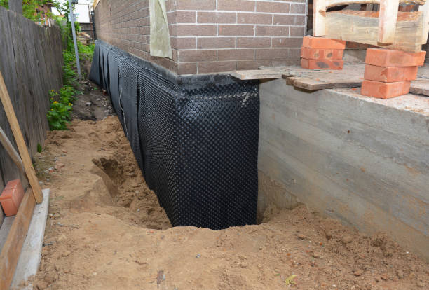 SJ Waterproofing Pros technician performing targeted Waterproofing assessment in Centerville, PA